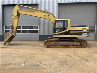 CAT 320BL - Including bucket with teeth / hammerlines