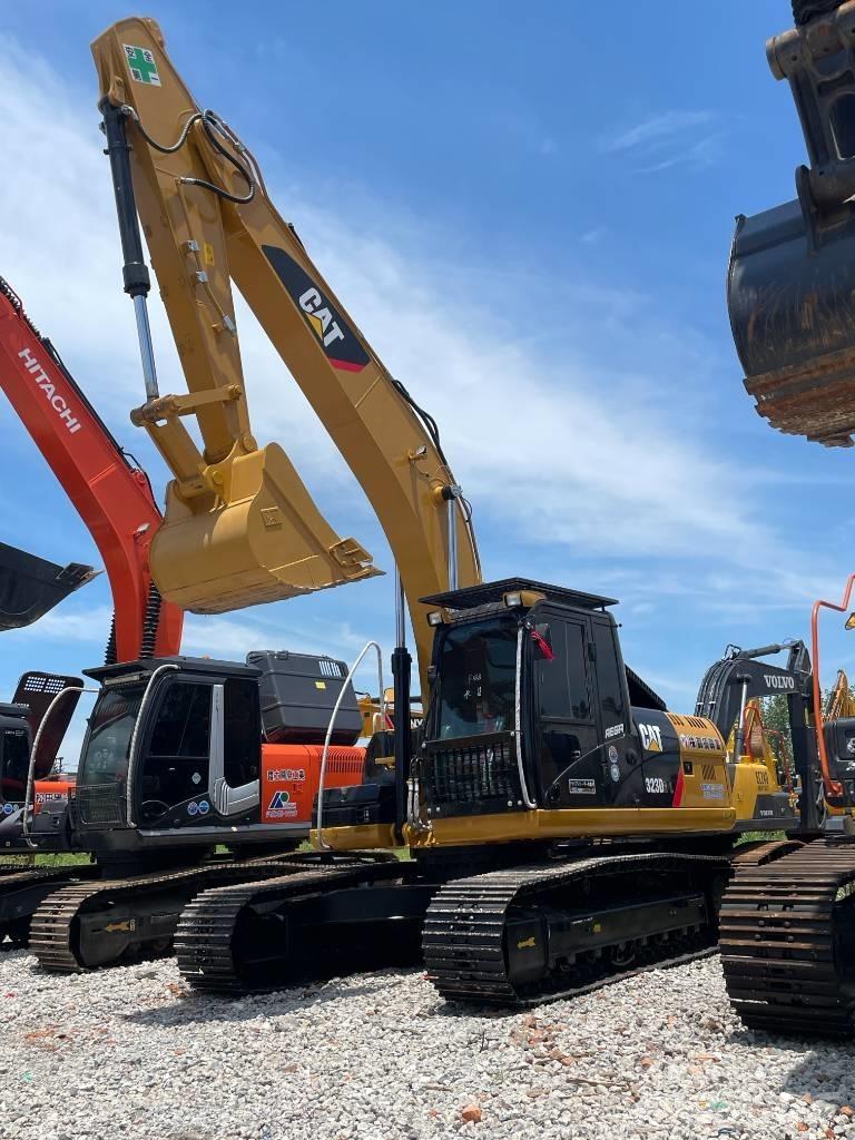 CAT 323 Escavatori cingolati