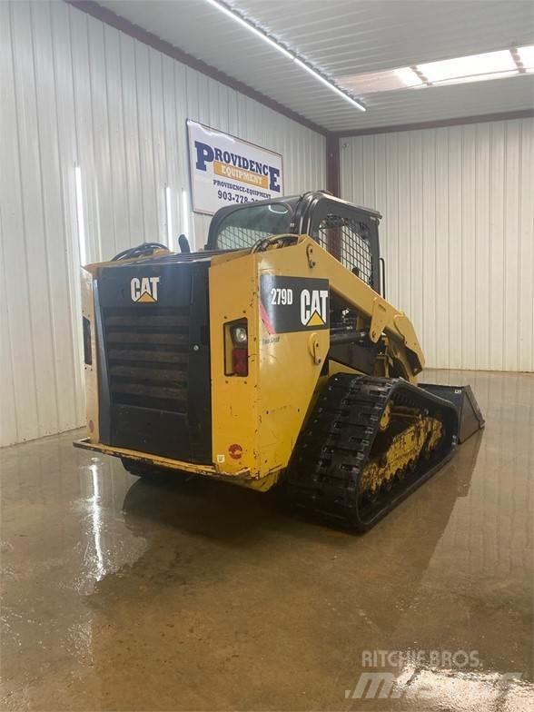 CAT 279D Mini Pale Gommate