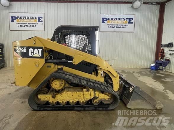 CAT 279D Mini Pale Gommate