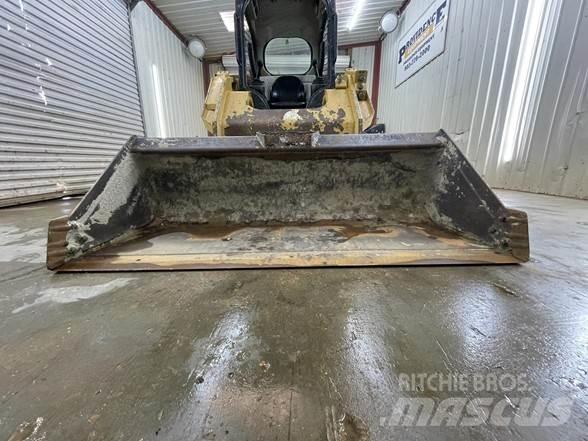 CAT 279D Mini Pale Gommate