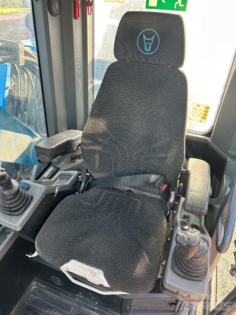 Fuchs MHL 320 T4F Movimentazione rifiuti