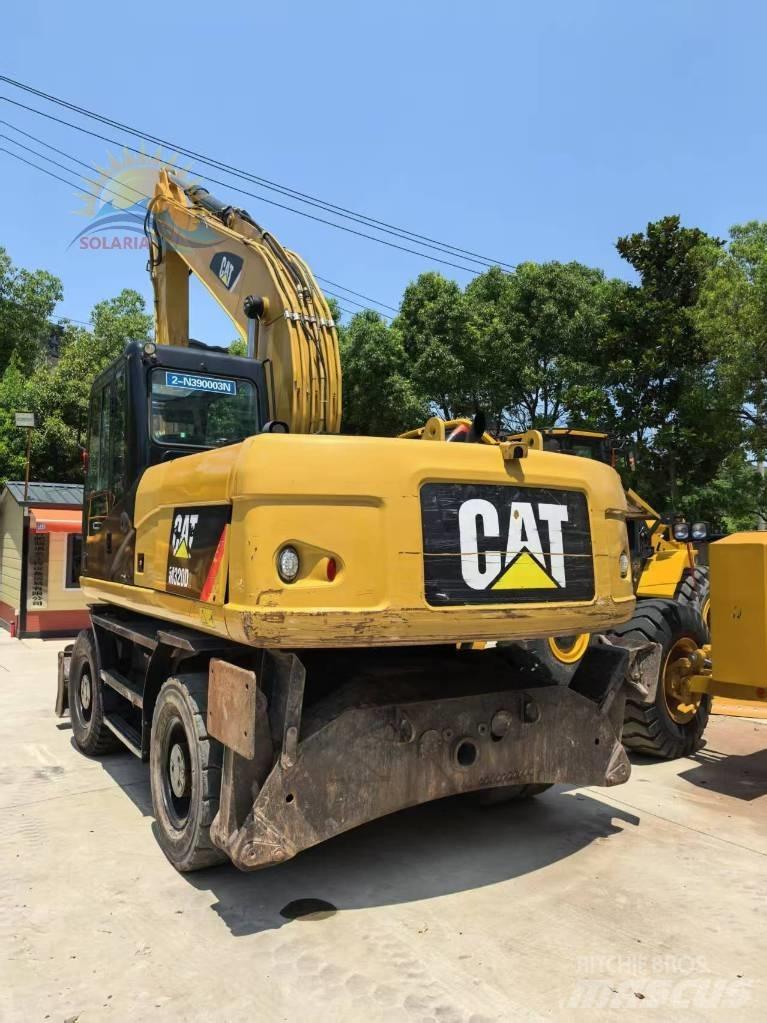CAT M 315 D2 Escavatori gommati