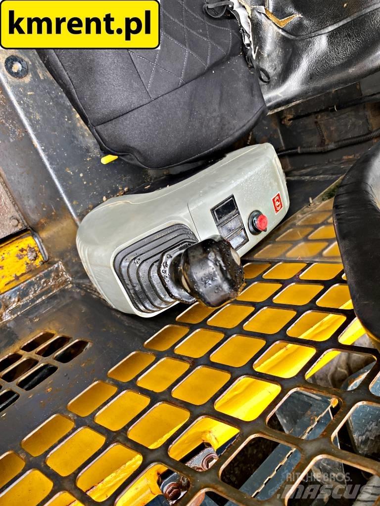 Komatsu SK 815 Mini Pale Gommate