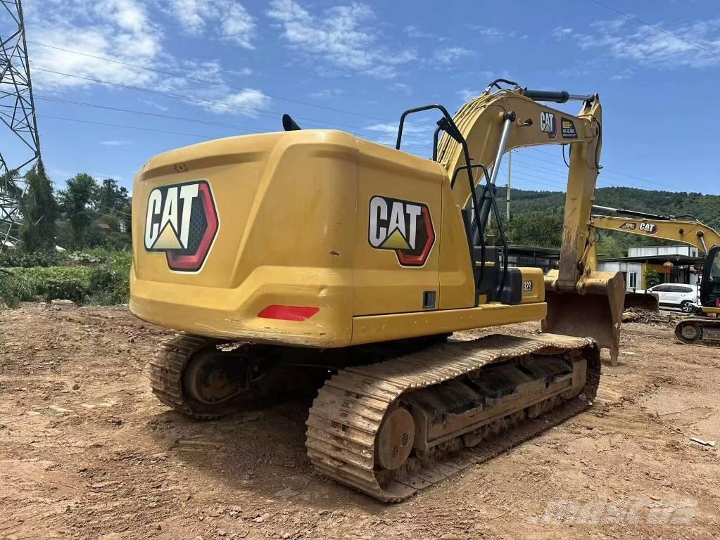 CAT 323 Escavatori cingolati