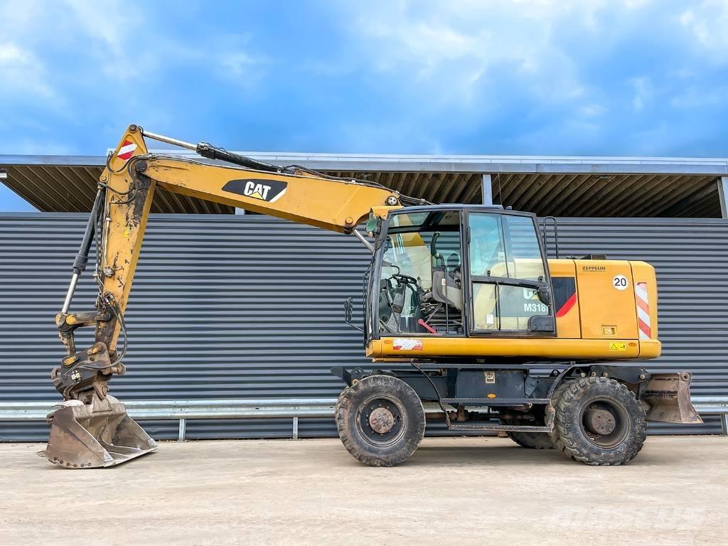 CAT M318F Escavatori gommati