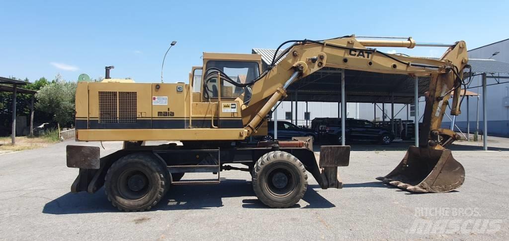 CAT 214 B Escavatori gommati