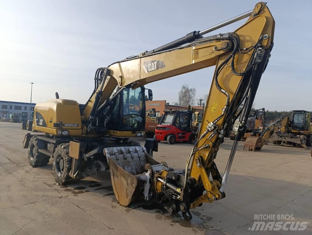 CAT M 313 D Escavatori gommati
