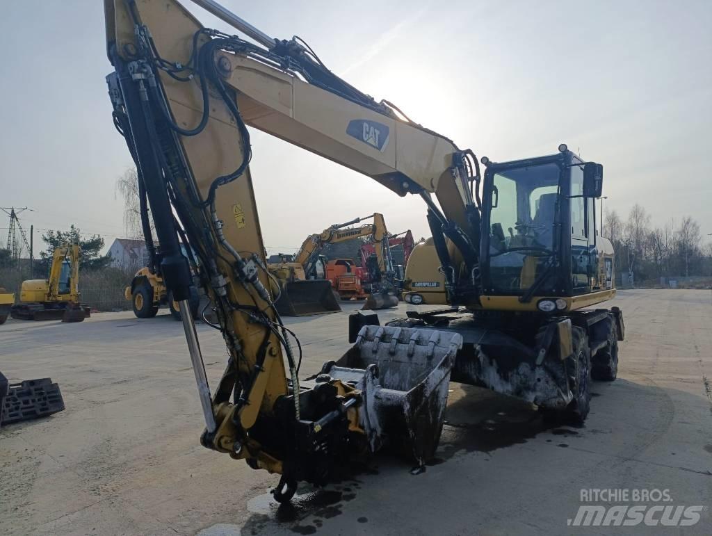 CAT M 313 D Escavatori gommati
