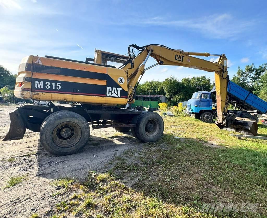 CAT M 315 Escavatori gommati