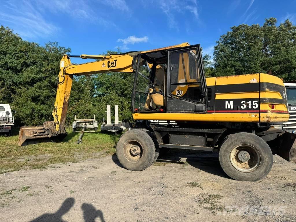 CAT M 315 Escavatori gommati