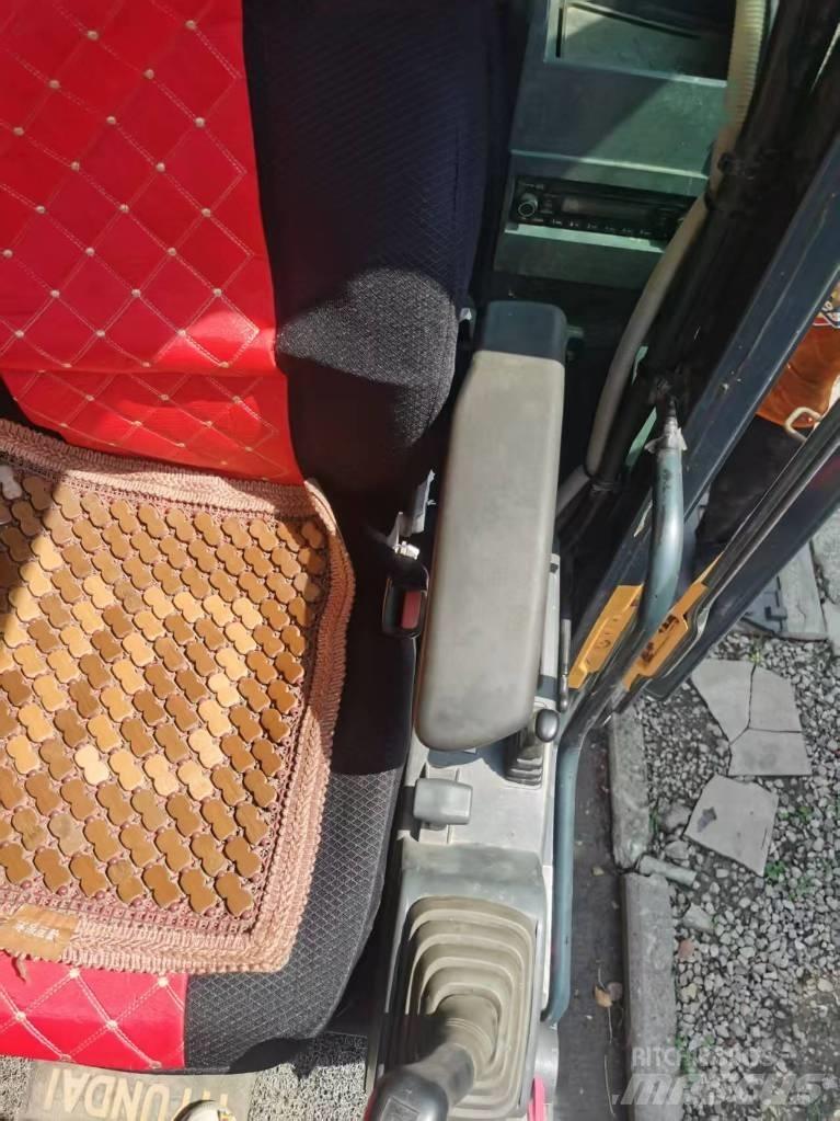 Hyundi 210w-9 Escavatori gommati