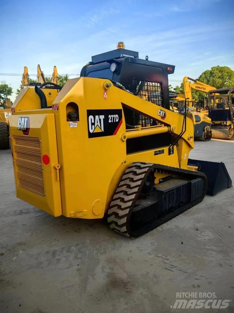 CAT 277 D Mini Pale Gommate