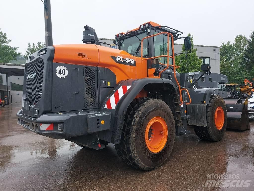 Develon DL 320-7 Pale gommate