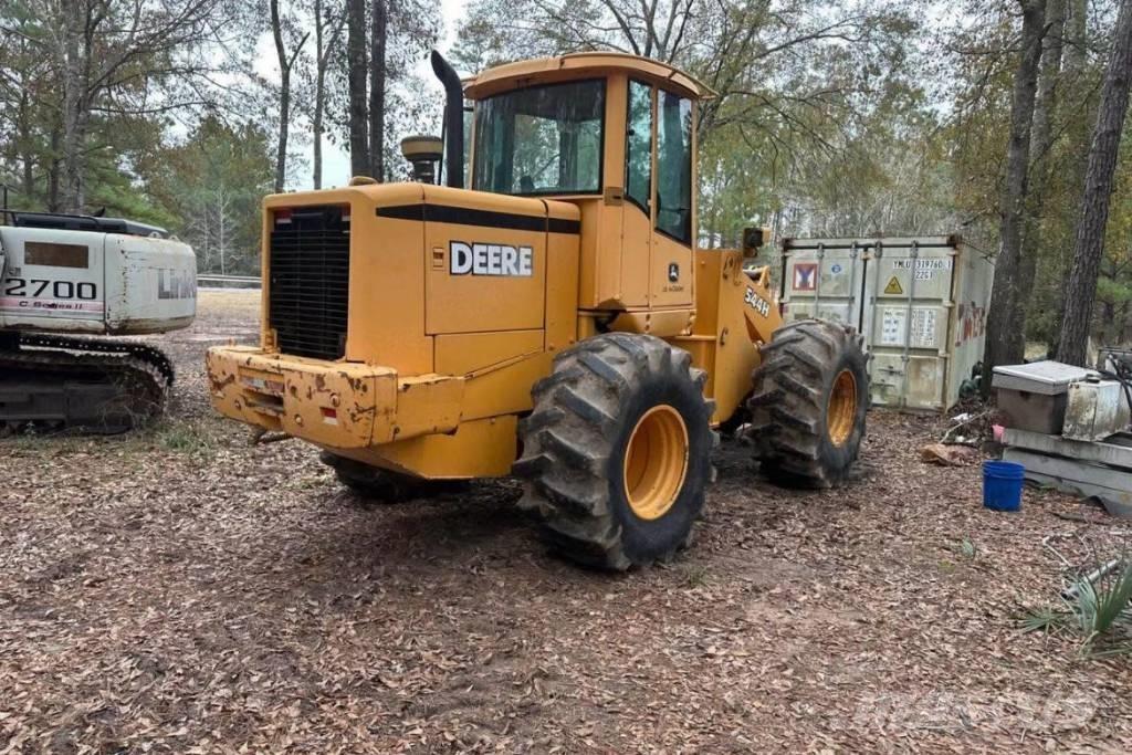 John Deere 544 H Pale gommate