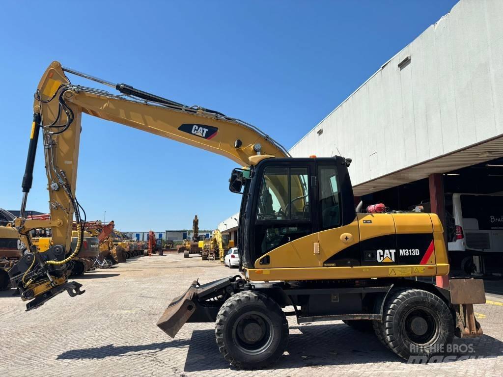 CAT M 313 D Escavatori gommati