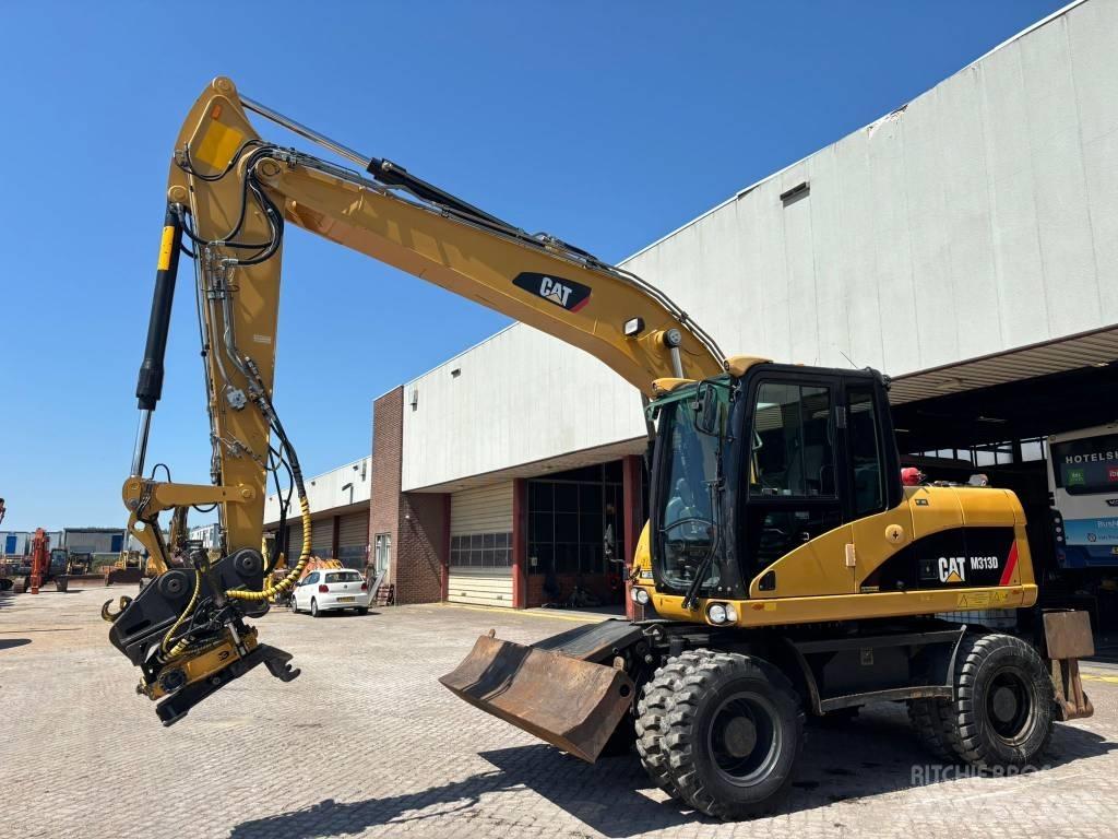 CAT M 313 D Escavatori gommati