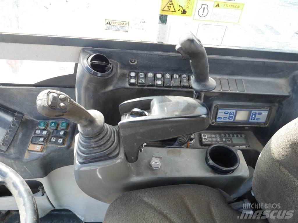 Takeuchi TB 295 W Escavatori gommati