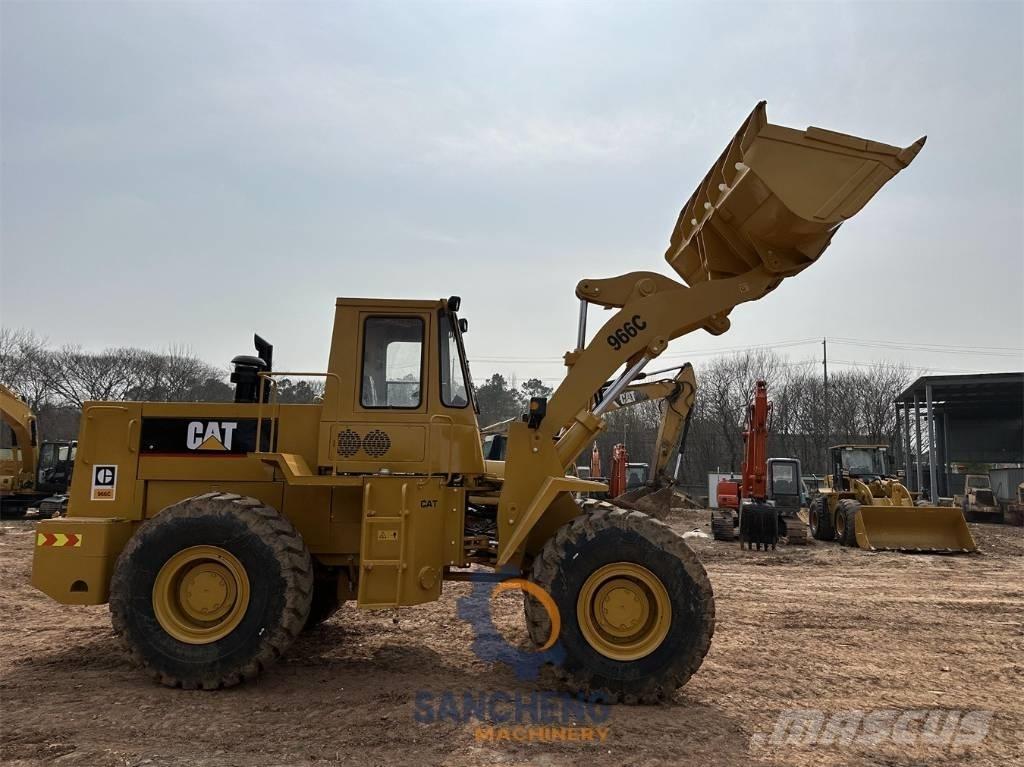 CAT 966C Pale gommate