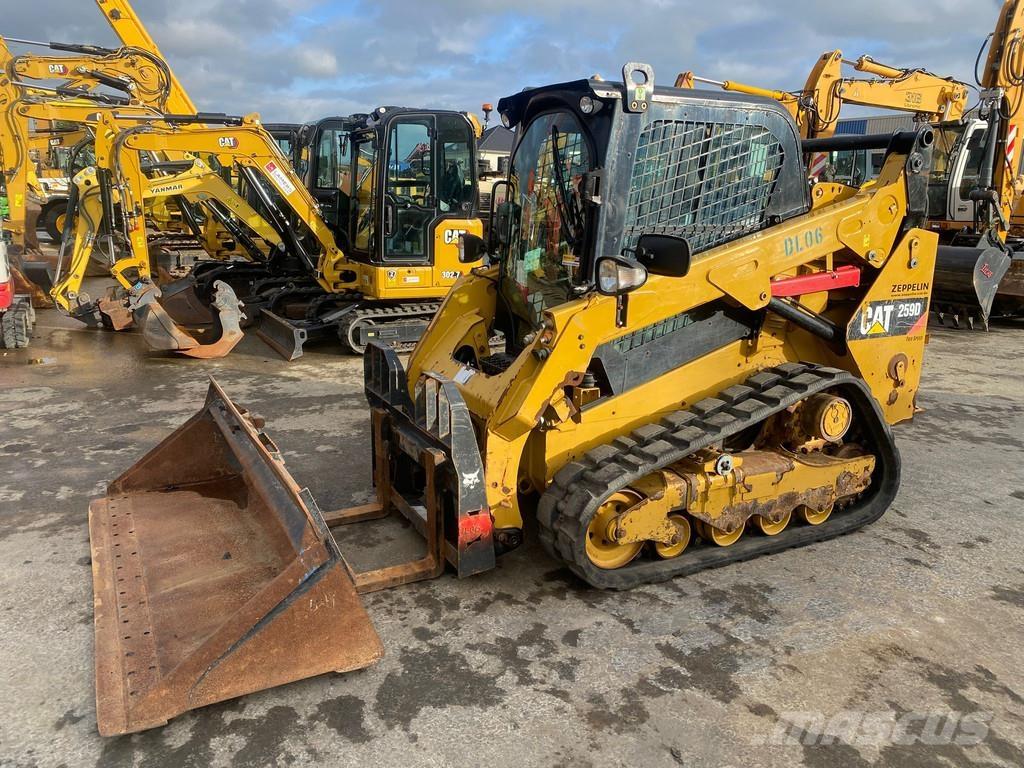 CAT 259D NVT Pale cingolate