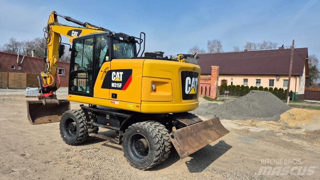 CAT M 315 F Escavatori gommati