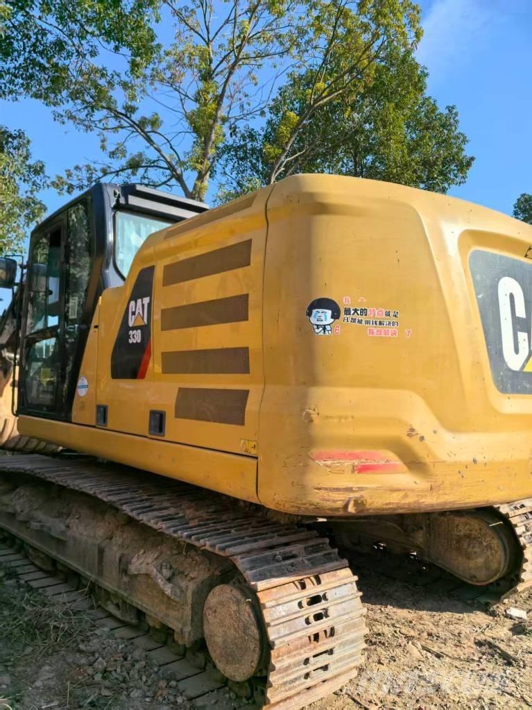 CAT 323 Escavatori cingolati