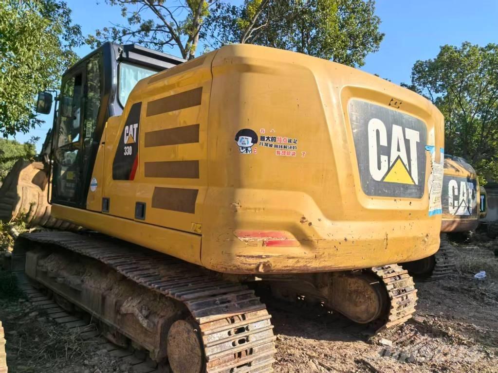 CAT 323 Escavatori cingolati