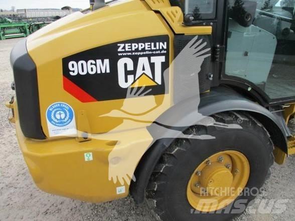 CAT 906M Pale gommate