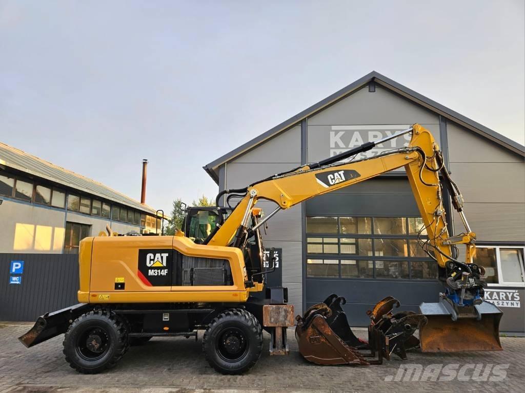 CAT M 314 Escavatori gommati