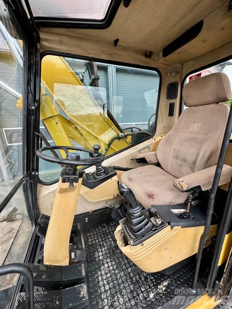 CAT M 315 Escavatori gommati