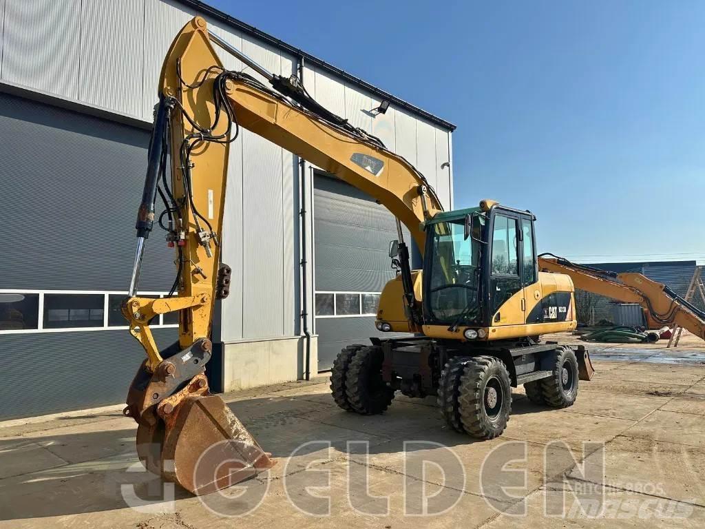 CAT M313D Escavatori gommati