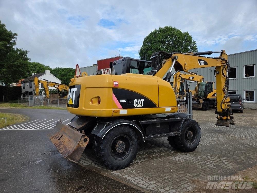 CAT M313D Escavatori gommati