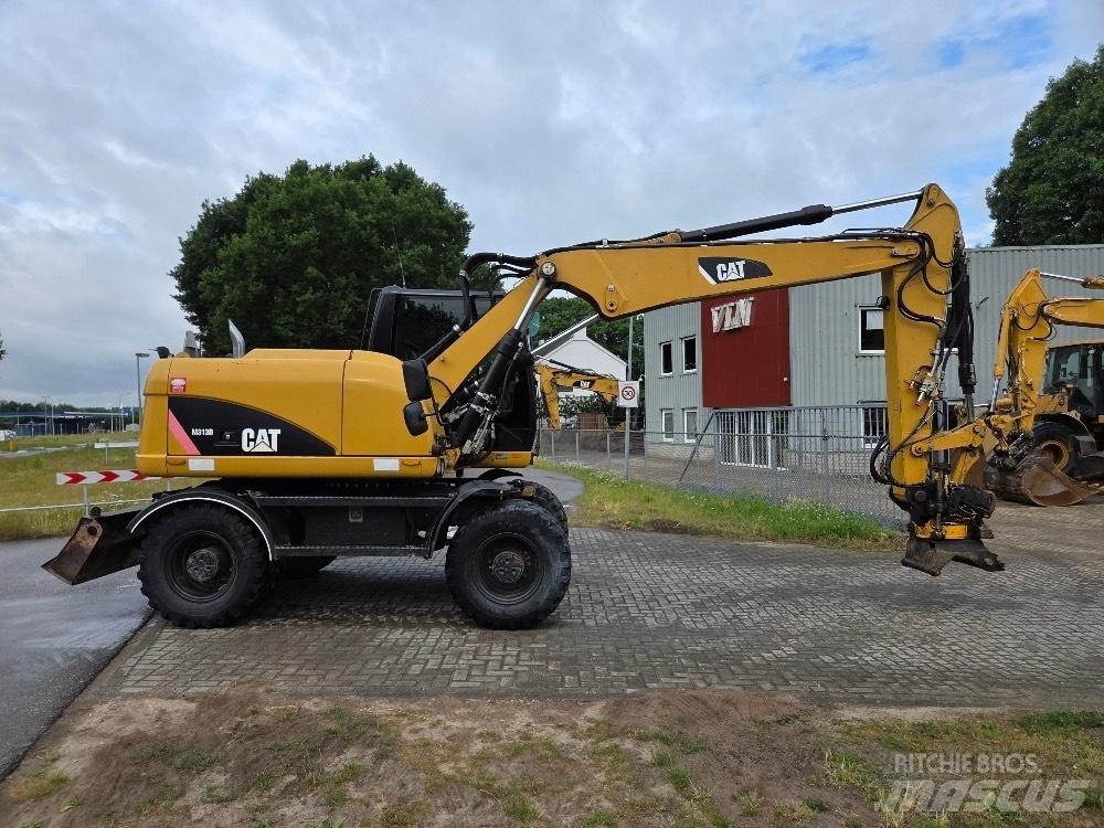 CAT M313D Escavatori gommati