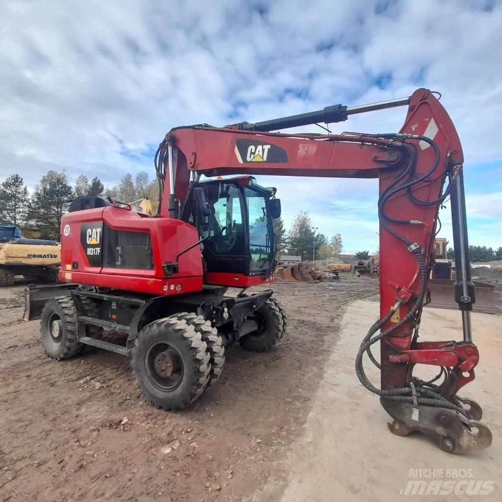 CAT M317 Escavatori gommati