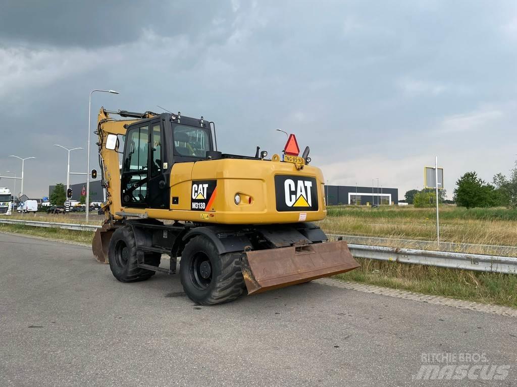 CAT M313D - CE Escavatori gommati