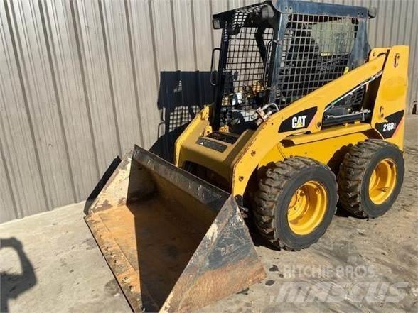 CAT 216B2 Mini Pale Gommate