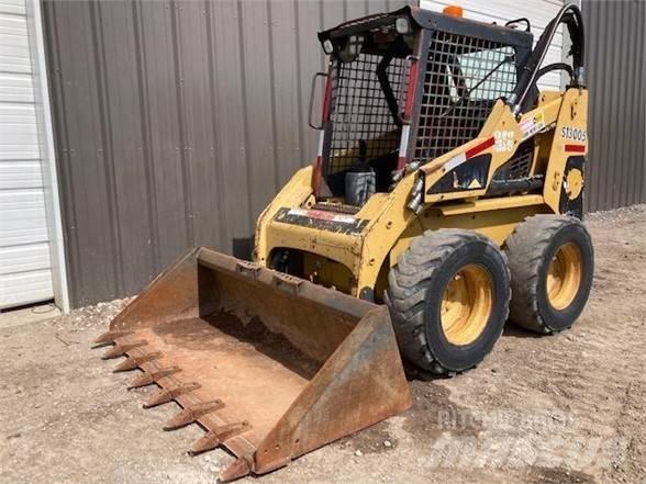CAT 228 Mini Pale Gommate