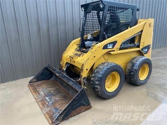 CAT 236B2 Mini Pale Gommate