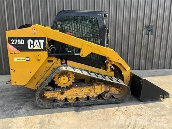CAT 279D Mini Pale Gommate