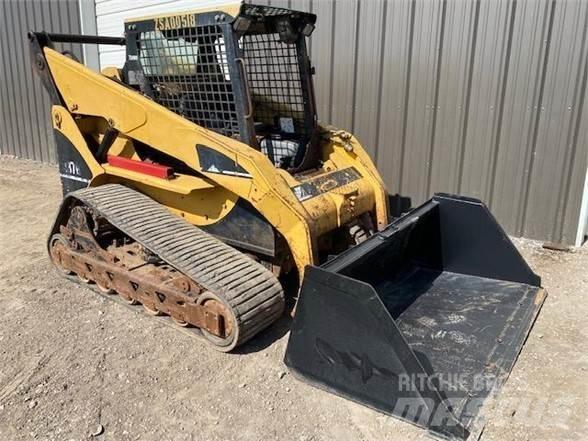 CAT 287B Mini Pale Gommate