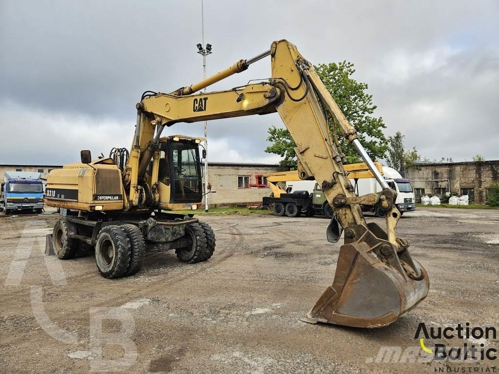 CAT M 318 C Escavatori gommati