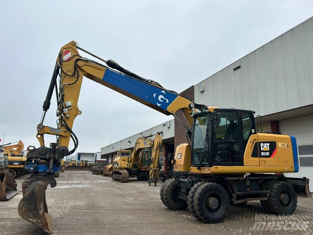 CAT M 318 F Escavatori gommati