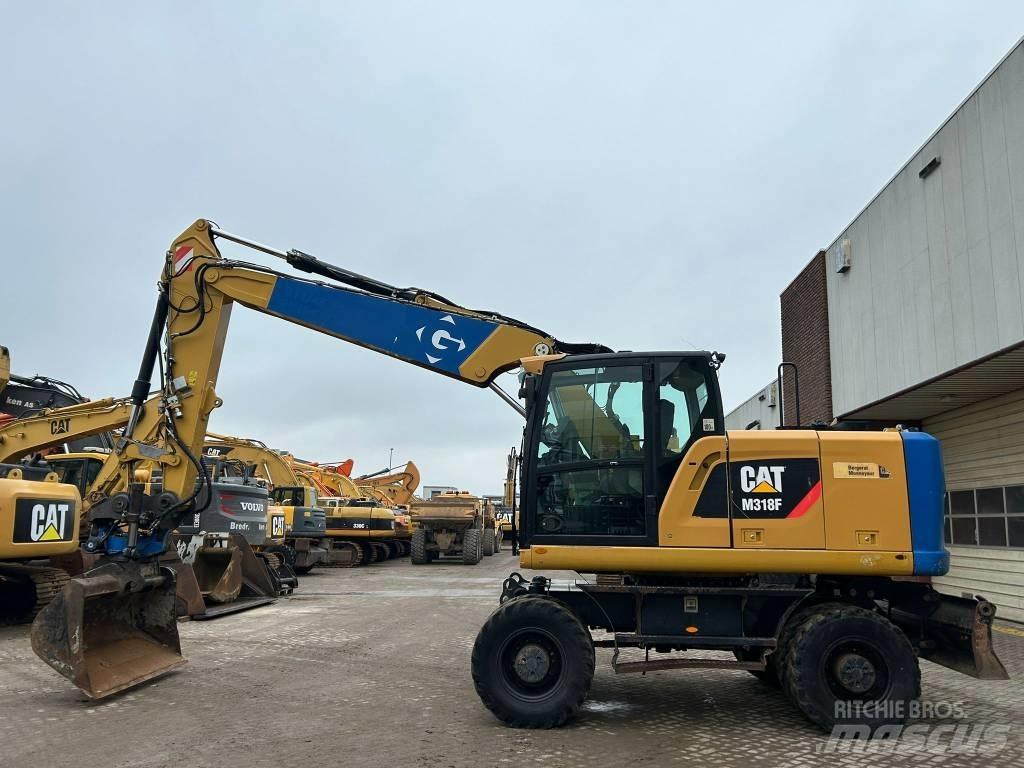 CAT M 318 F Escavatori gommati