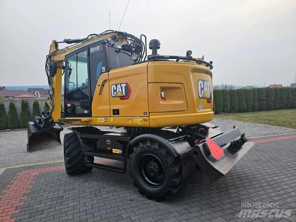 CAT M 315 F Escavatori gommati
