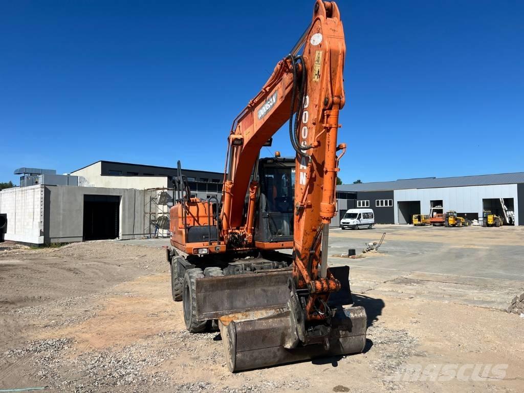 Doosan DX 140 W Escavatori gommati