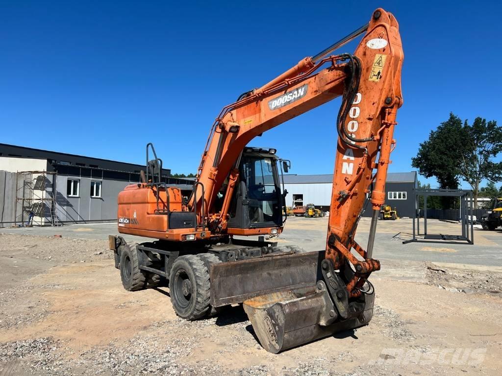 Doosan DX 140 W Escavatori gommati
