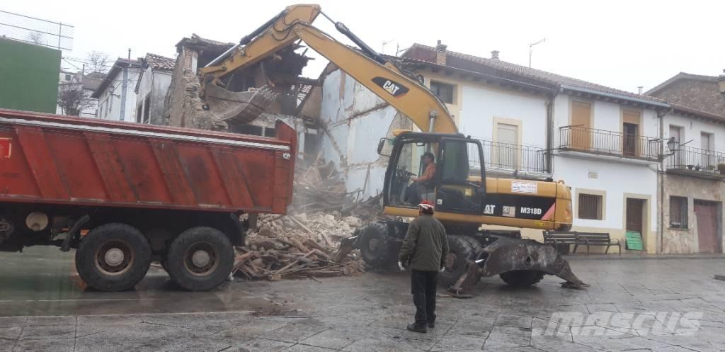 CAT M318d Escavatori gommati