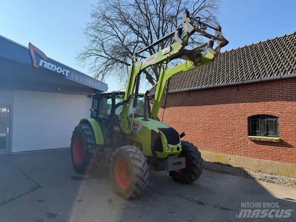 CLAAS Axos 330 Trattori