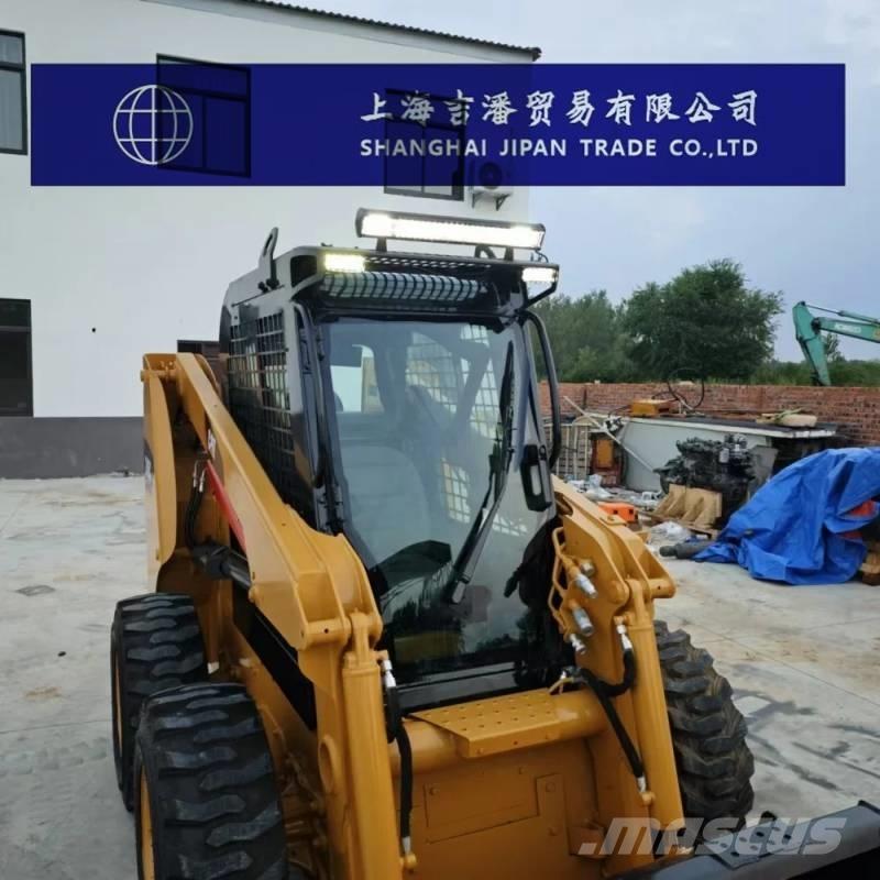 CAT 246 C Mini Pale Gommate