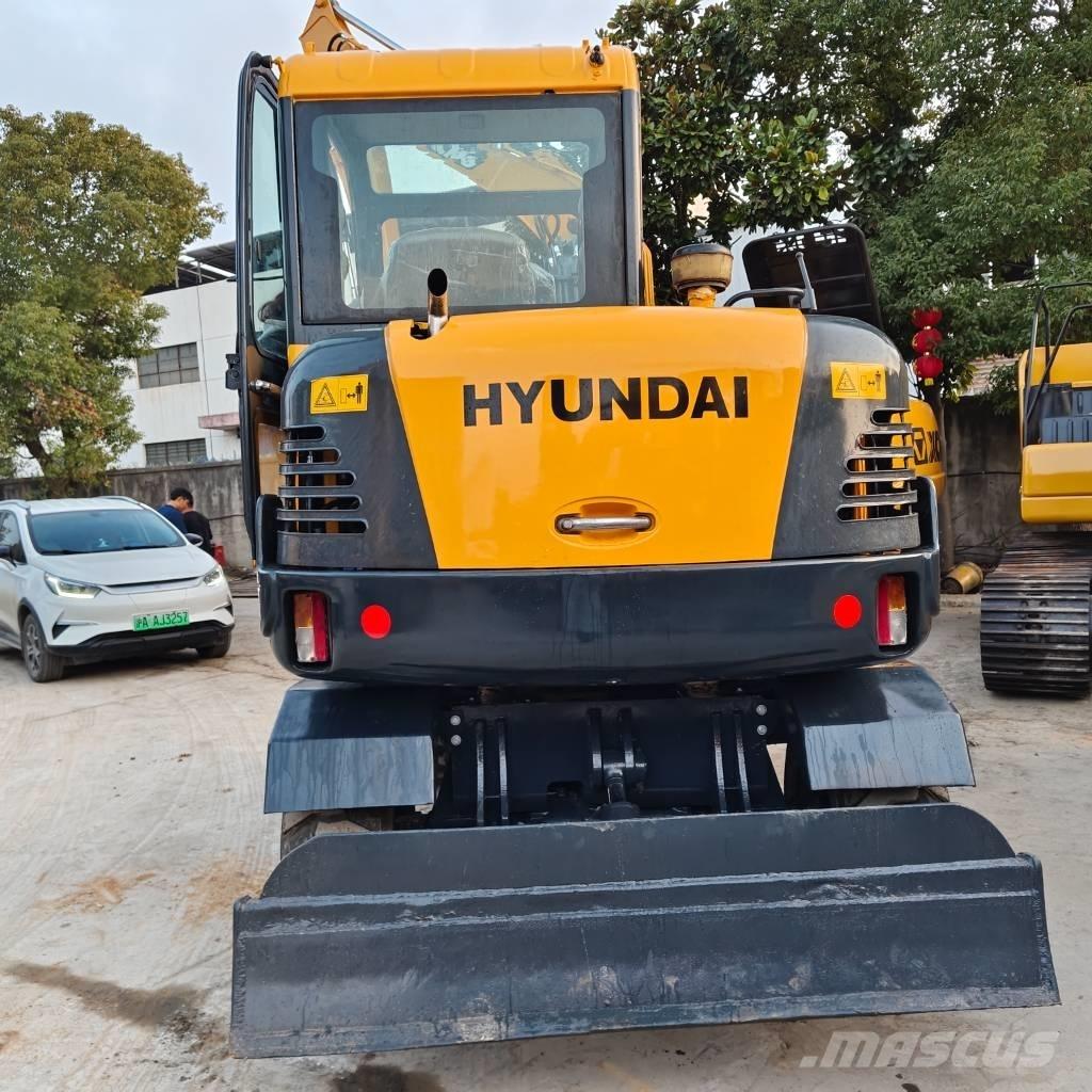 Hyundai 60 W VS Escavatori gommati